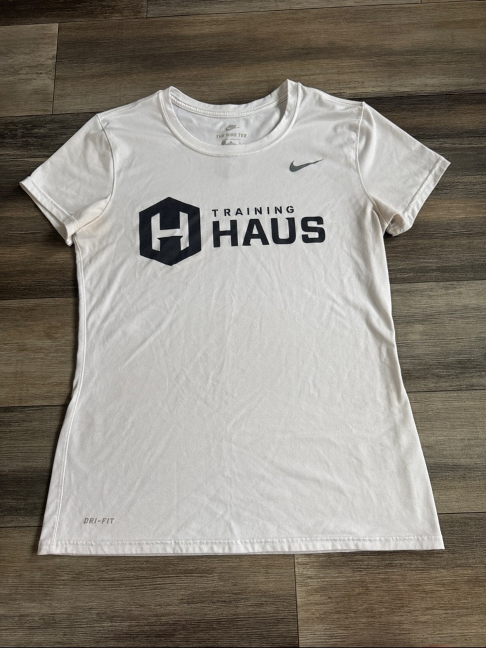 Nike Women’s White Training HAUS Short Sleeve Tee with Black Logo
